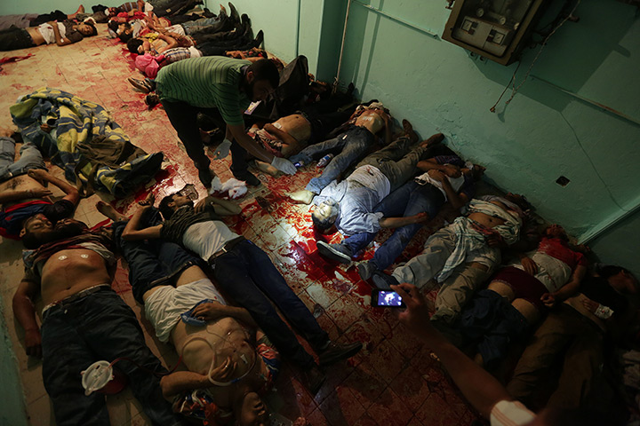 Bodies lie in a room of a hospital after a shooting happened at the Republi