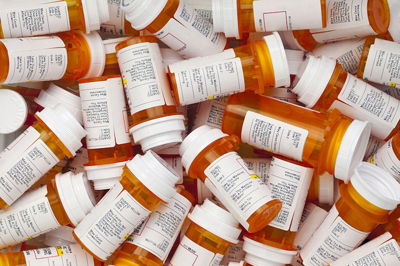 Dozens of Prescription Pill Bottles